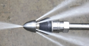 Rhino Rooter using a strong water jet nozzle to clear tough clogs from pipes in The Wasatch Front area.